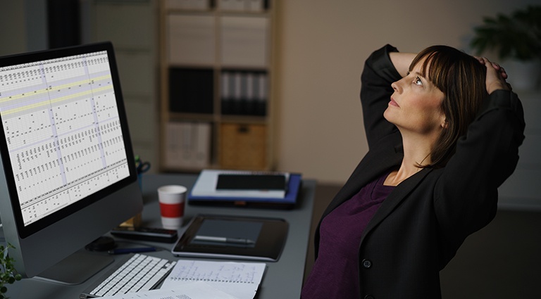 5-Signs-ItE28099s-Time-for-a-Career-Change Stressed out female entrepreneur looking at a spreadsheet