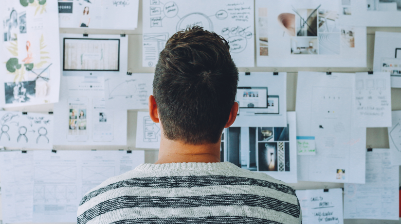 Blog20Covers20-202024-04-30T154954.625 Young man looking at a concept board