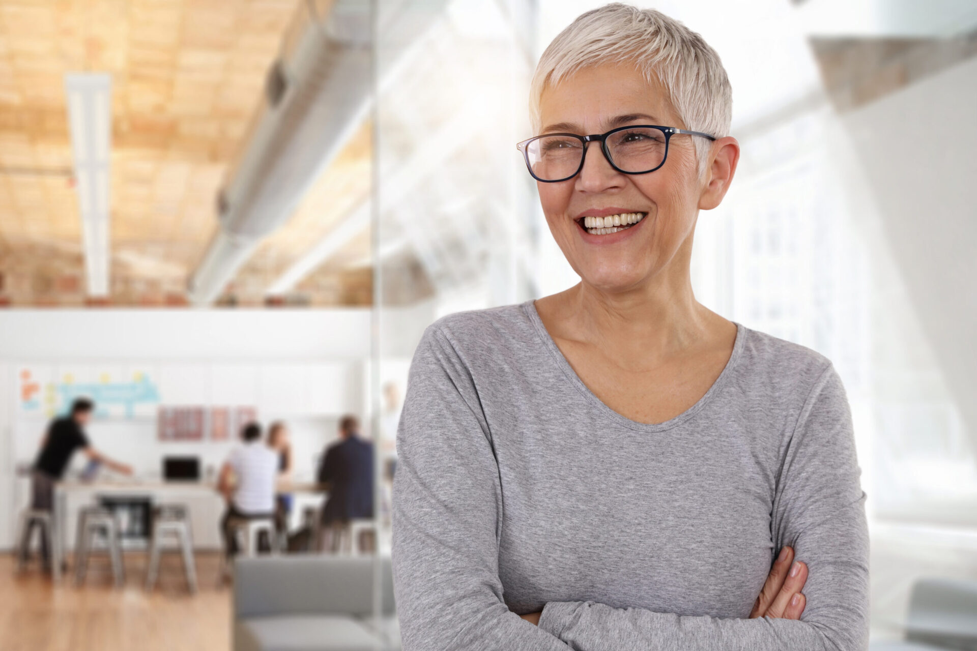 Happy smiling business woman in an office.