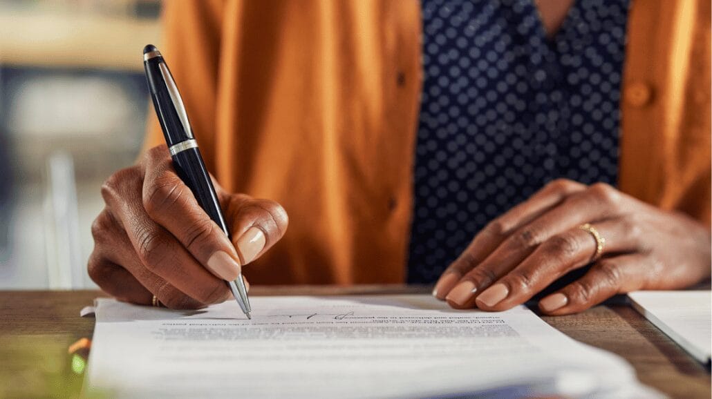 Blog Covers – 2025-02-25T103824.477 Female business woman filling out paperwork