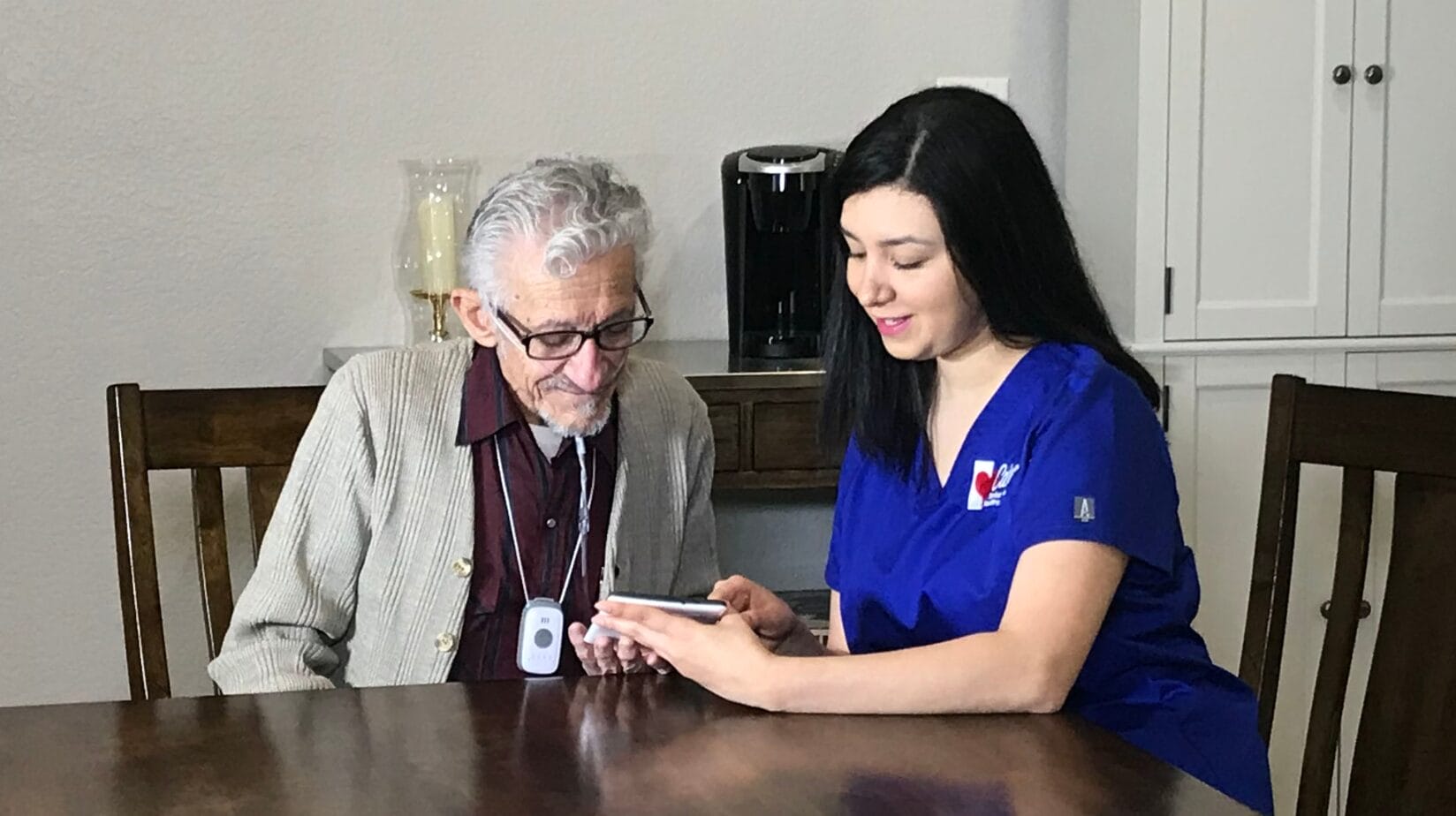 Blog Covers – 2025-03-04T084607.719 Caring Senior Service caregiver on a tablet with a client