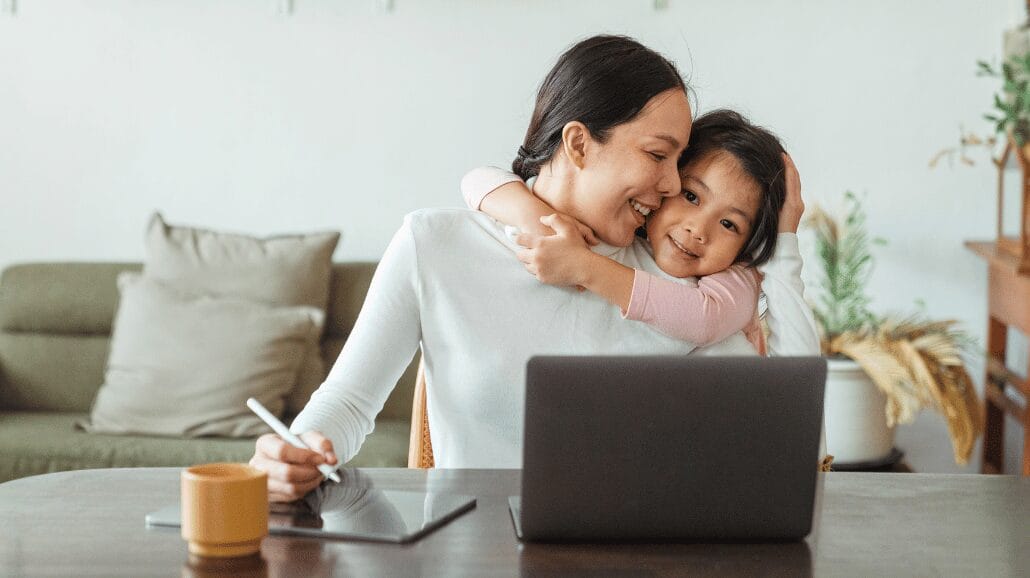 Blog Covers – 2025-04-30T083703.568 Working mother giving a hug to her daughter