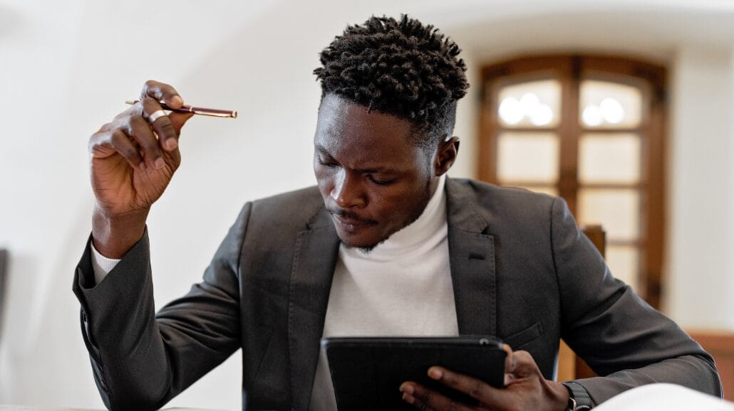 Blog Covers – 2025-07-30T143242.251 Black entrepreneur reviewing paperwork