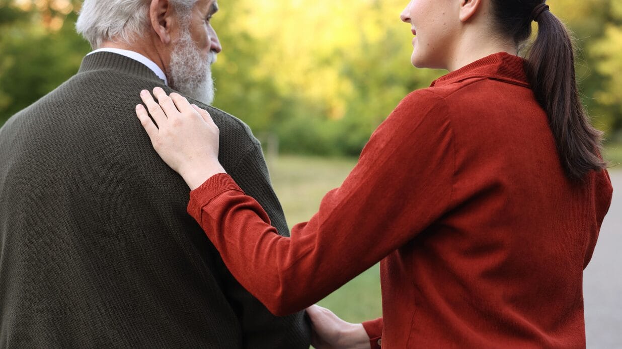 Blog Covers (6) Caregiver walking with a senior man outside
